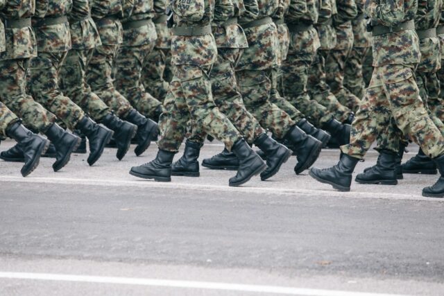 soldiers marching in uniform