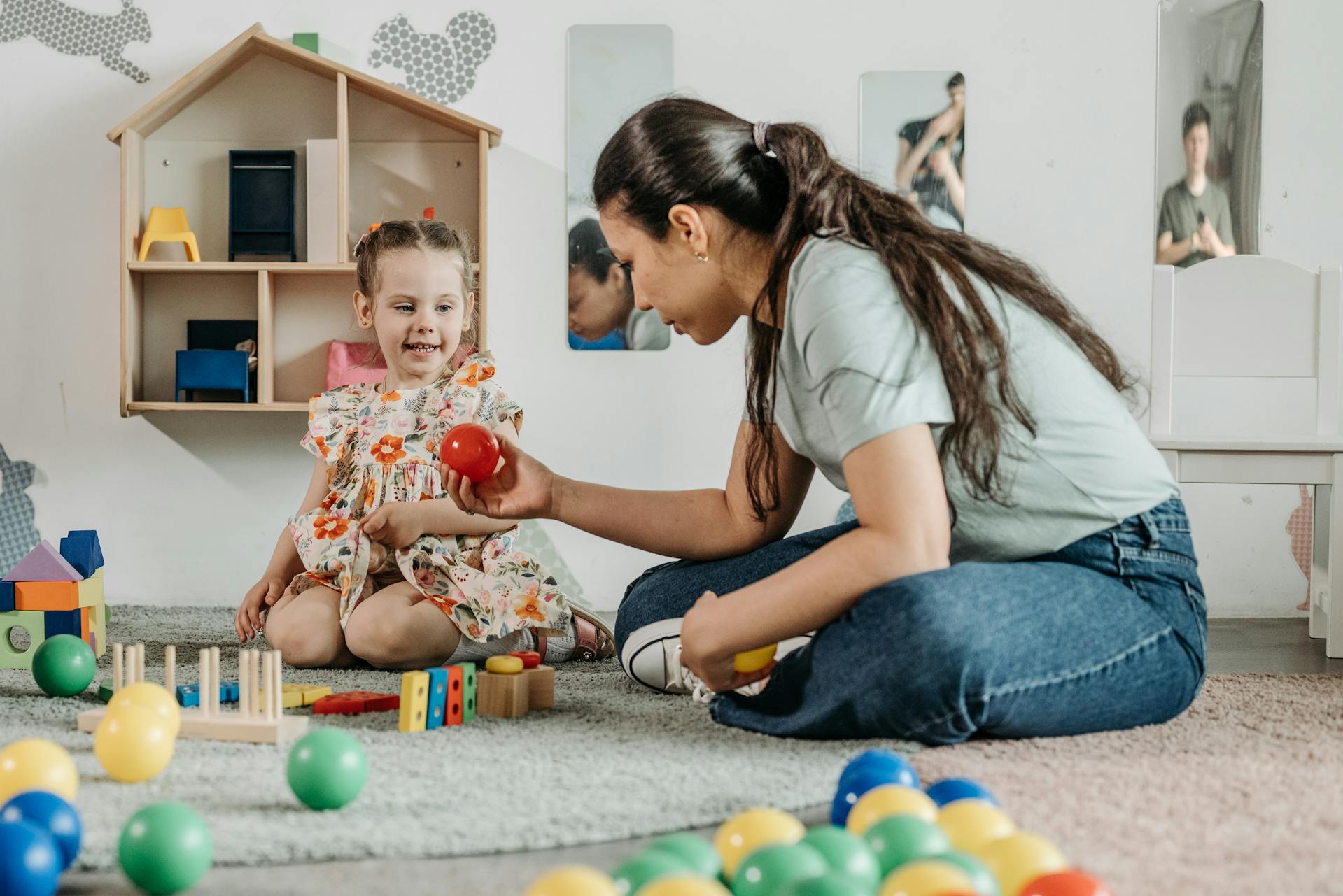 woman playing with child
